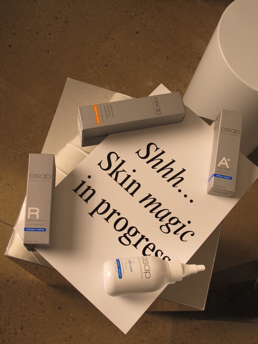 ASAP skincare laid around a card reading "Shhh… Skin magic in progress"